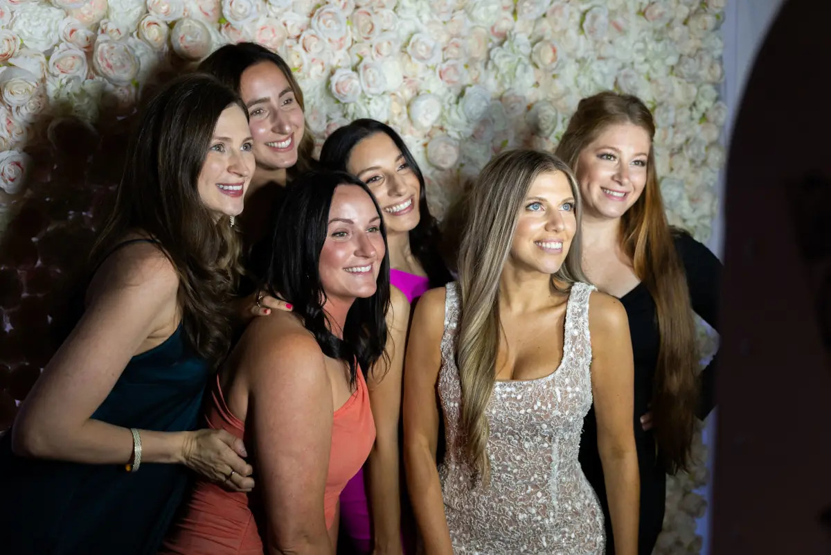 Women inside event photo booth in NYC